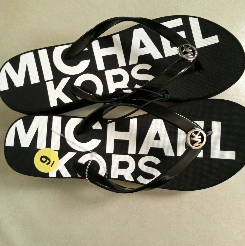 Michael Kors flip-flops size 9 for women